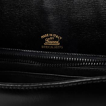 Gucci, Translation: "bag, vintage".