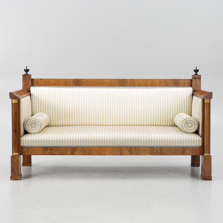 An Empire sofa, first half of the 19th century.