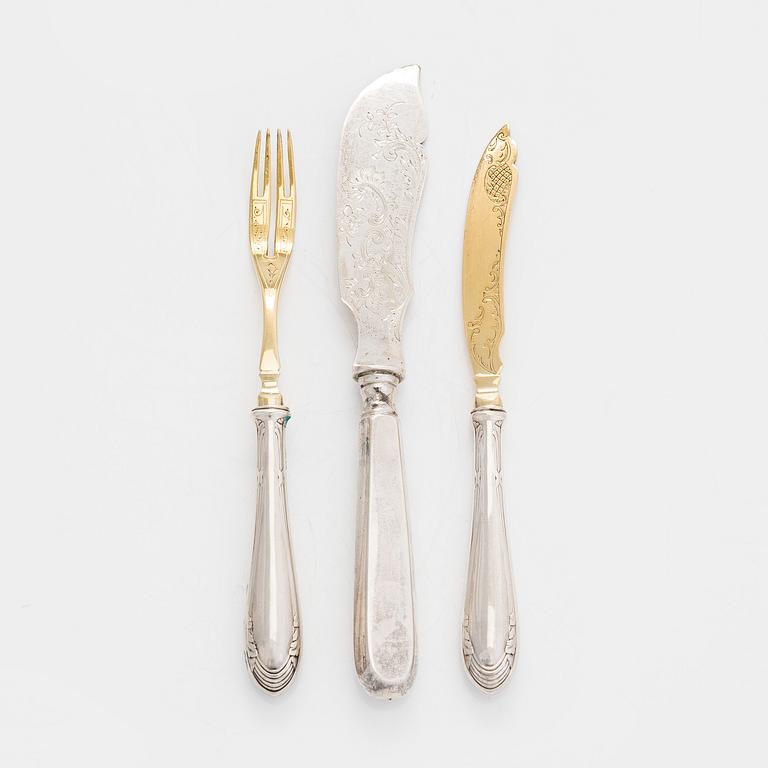 A 12-piece set of parcel-gilt fruit cutlery, and a silver butter knife, maker's mark Iisakki Saha, Pori 1898-1899.