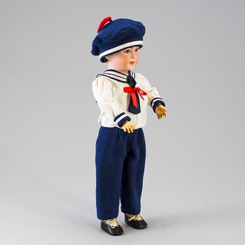 A bisque head boy doll 238 by S.F.B.J, Paris, France, 1910s.