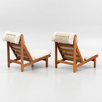 Bernt Pedersen, a pair of pine 'Kludestolen' easy chairs, Denmark, 1970's.