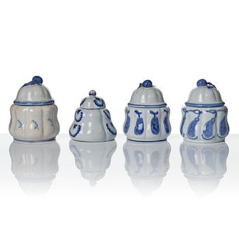 Wilhelm Kåge, eleven pieces of faience including jars, inkwells and a tulip vase, Gustavsberg, Sweden, 1919-1920.