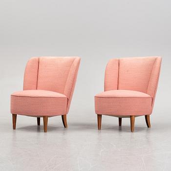 A pair of 1940's easy chairs.