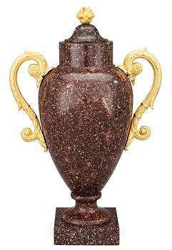 561. A Swedish Empire 19th Century porphyry and gilt bronze urn.
