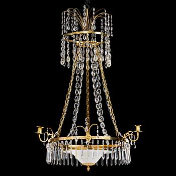 131. A late Gustavian gilt brass and cut glass four-light chandelier, Stockholm, late 18th century.