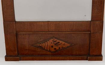 A first half of the 20th Century mahogany veneered mirror.
