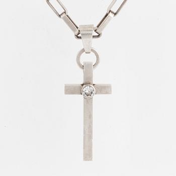 ANDERS HÖGBERG, silver cross necklace.