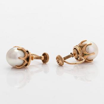 A pair of 14K gold earrings with cultured pearls.