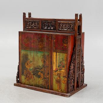 A cabinet, China, 20th century with older parts.