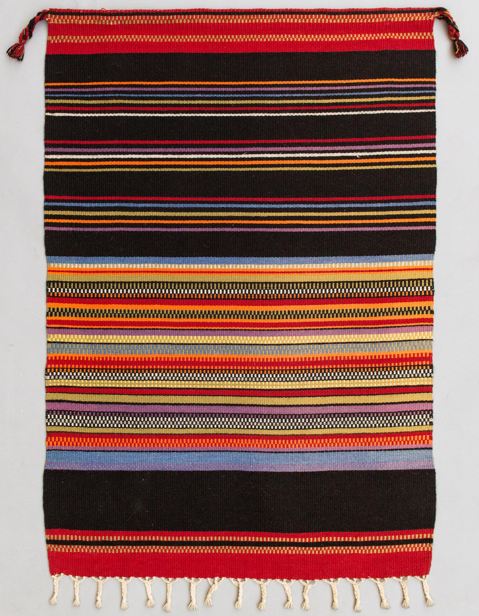 Elsa Montell-Saanio, A Raanu "Maddar Ahku" textile from Lapland designed by Elsa Montell-Saanio. Circa 132x90 cm.