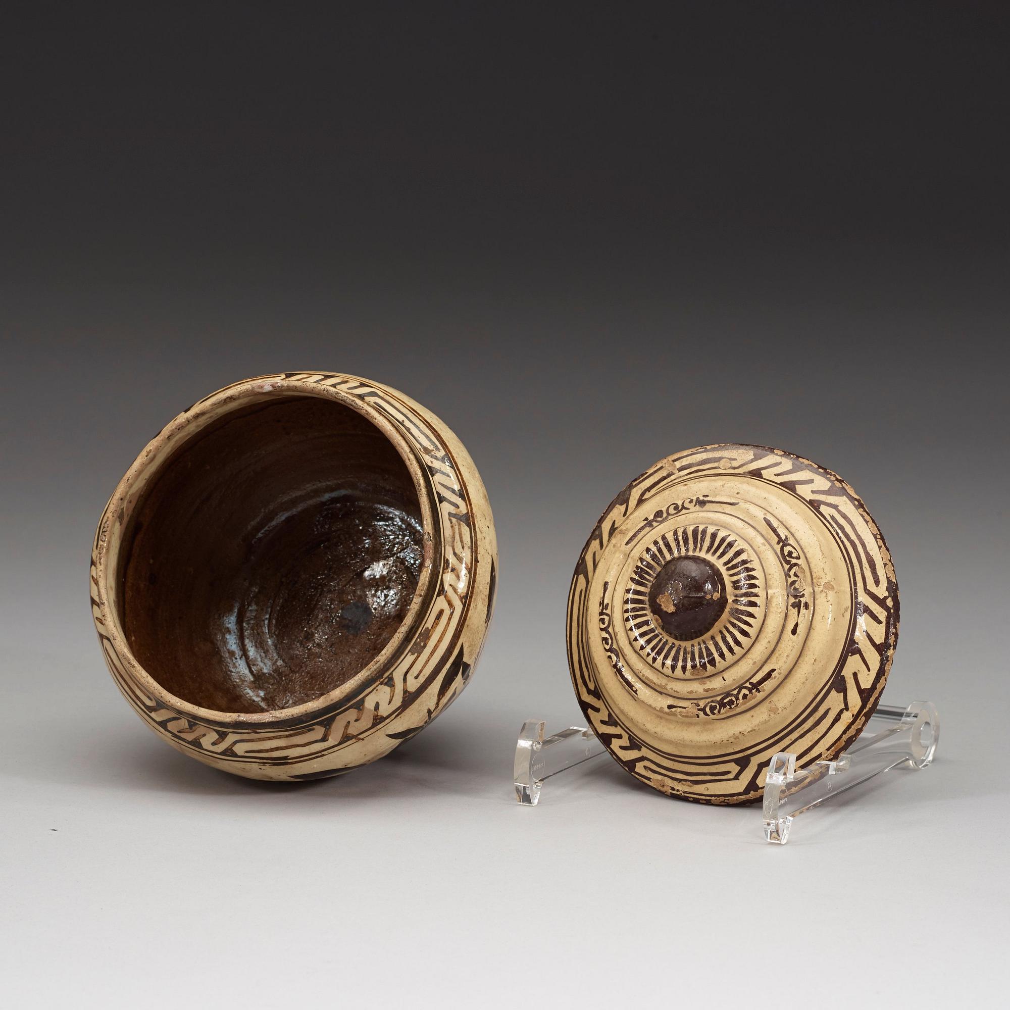 A Cizhou ware pot with cover, presumably Yuan dynasty (1260-1370).