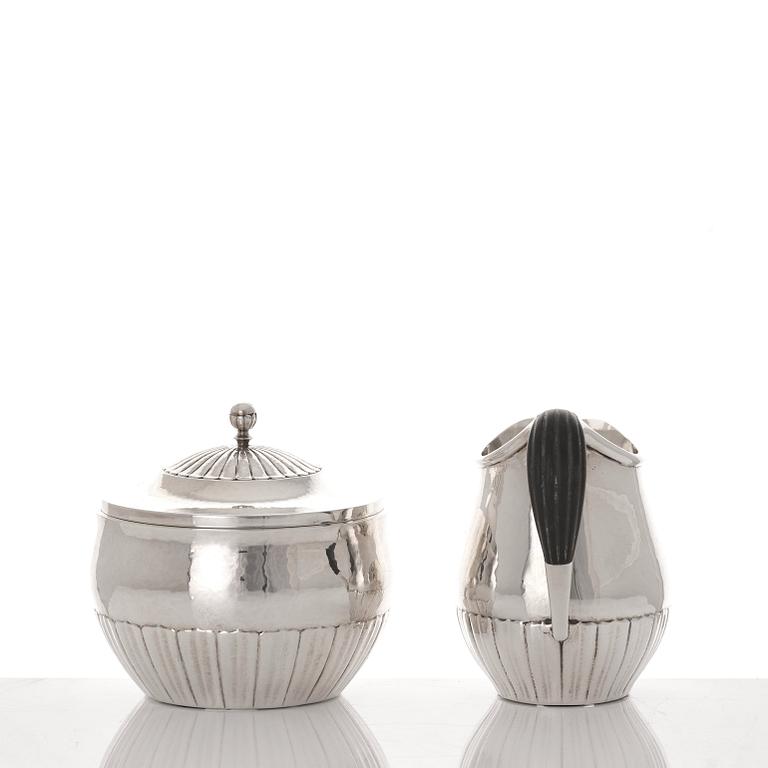 Johan Rohde, a three pieces sterling silver coffee service "Cosmos", Georg Jensen, Copenhagen 1945-77, design nr 45 A + D.