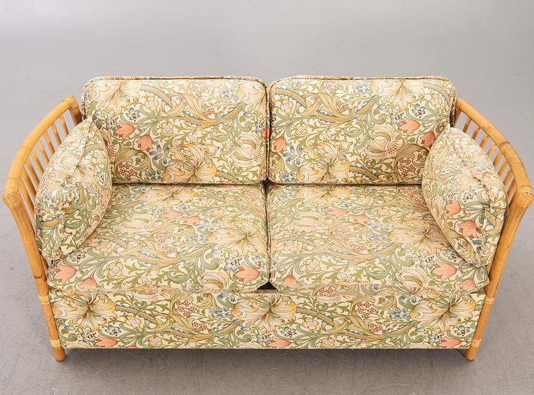 A bamboo and rattan sofa later  part of the 20th century.