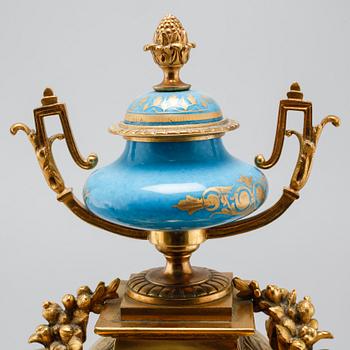 A 19th century mantle piece clock in Louis XVI-style.