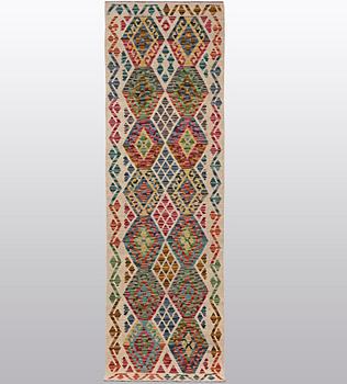 A runner, kilim, ca 249 x 67 cm.