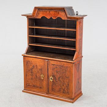 A late Baroque burr alder-veneered cabinet, first part of the 18th Century.