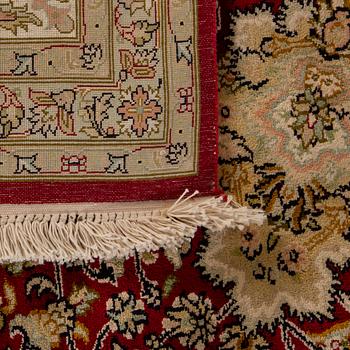 A Kashmir silk carpet ca 310 x 216 cm.