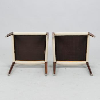 Niels Otto Møller, A 1950s dining table and six '77' chairs for J.L. Møllers Møbelfabrik Denmark.
