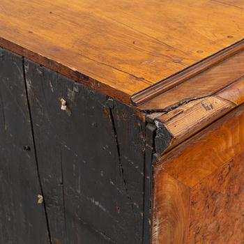 A Swedish root veneered late baroque chest of drawers, first half of the 18th century.