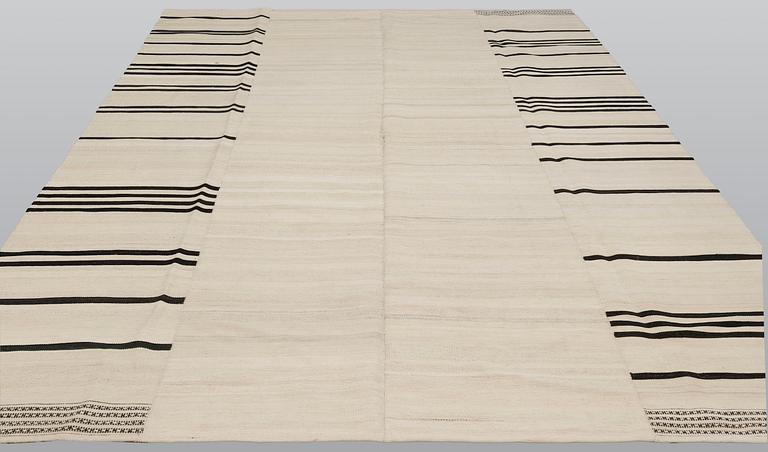 A carpet, Kilim, ca 315 x 225 cm.