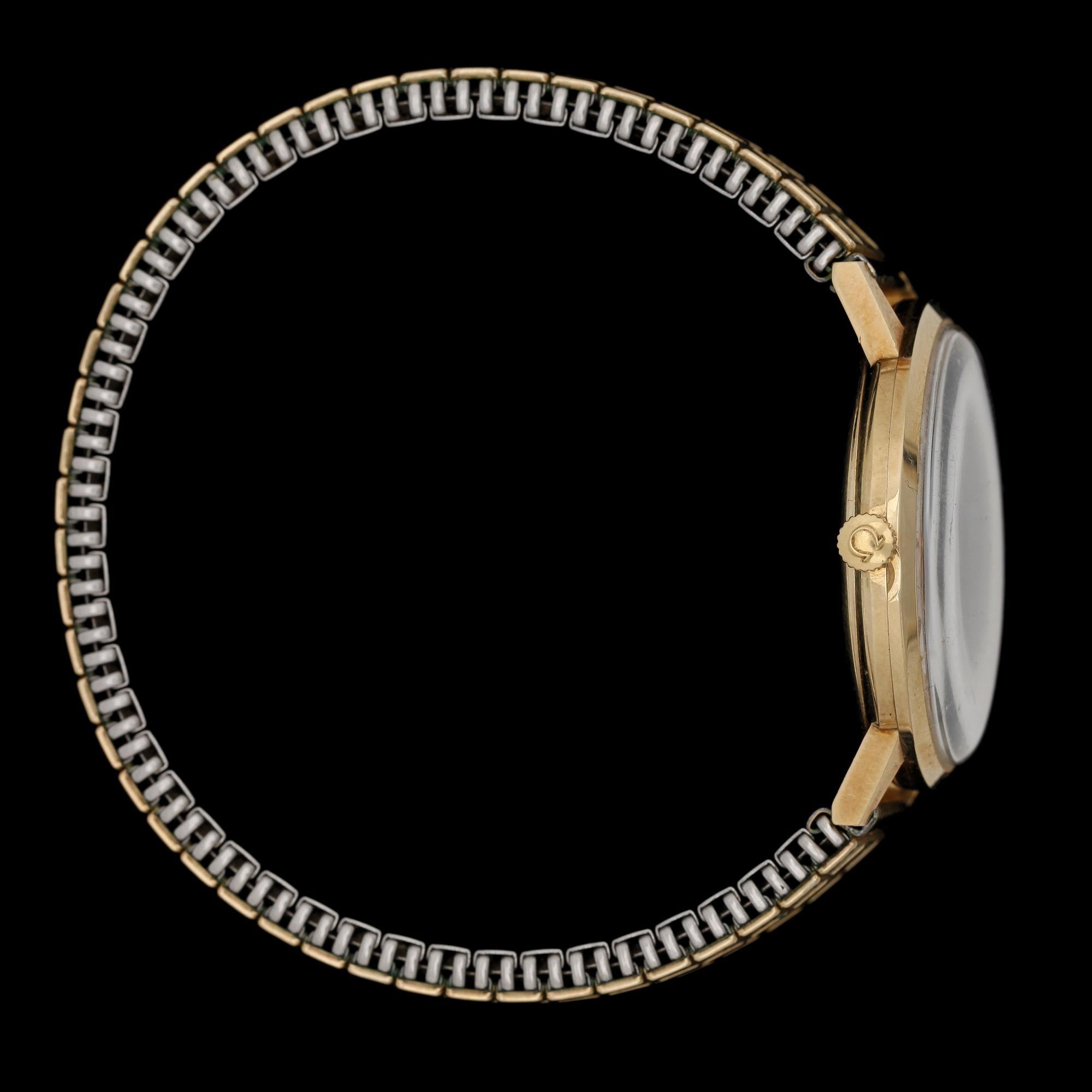 ARMBANDSUR, herr, guld på stål, Omega.