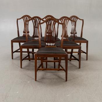A set of six mahogany Hepplewhite style 20th century chairs.