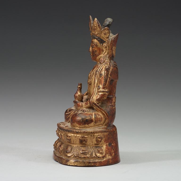 A gilt copper alloy sculpture of Guanyin, Ming dynasty (13668-1644).