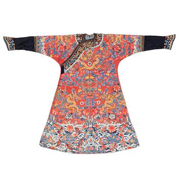 990. An embroidered red ground five clawed dragon 'female' formal robe, Qing dynasty, 19th century.