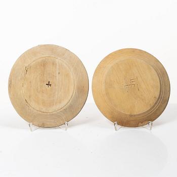 Ten wooden plates, 19th Century.