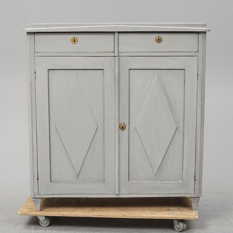 A mid 19th Century painted cupboard.