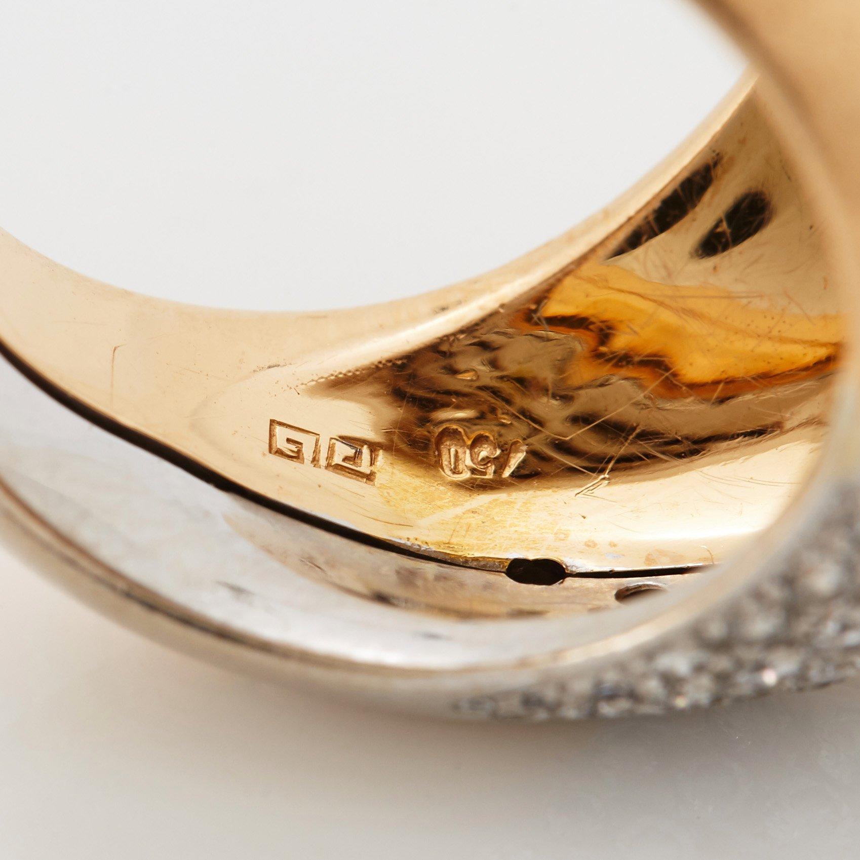 Paul Binder ring 18K guld med runda briljantslipade diamanter.