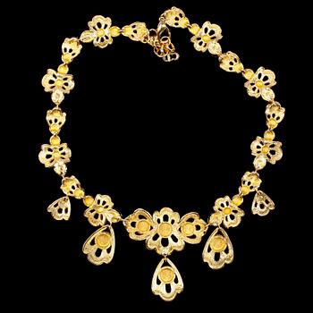 A necklace and a pair of earclips by Christian Dior.