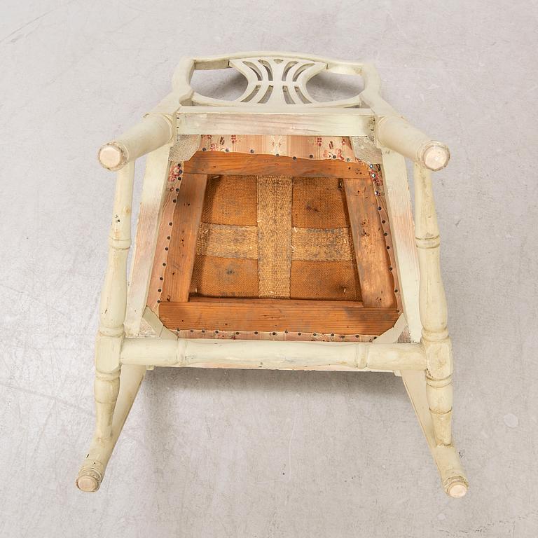 A öpair of painted Gustavian chairs.