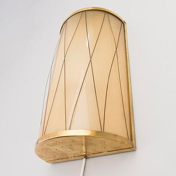 A mid 20th century '3061' wall light for Stockmann Orno, Finland.