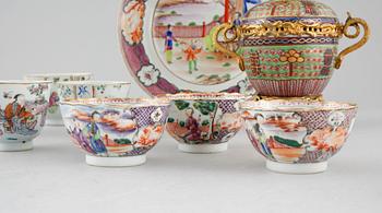 Three polychrome cups with barrels, three cups, one bowl with lid and one plate, Qing dynasty, 18/19th century.