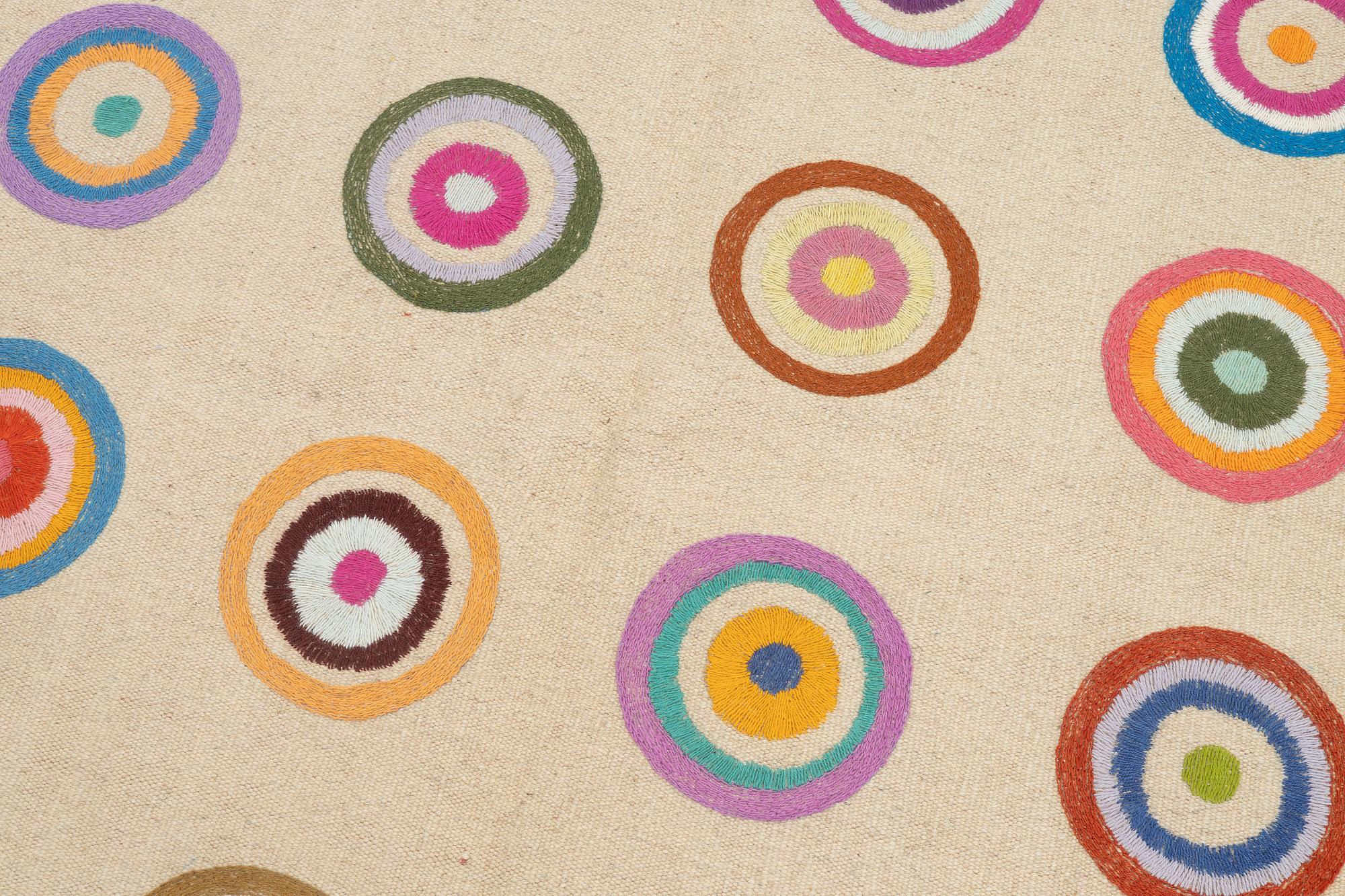 A hand-embroidered kilim rug, c. 183 x 125 cm.