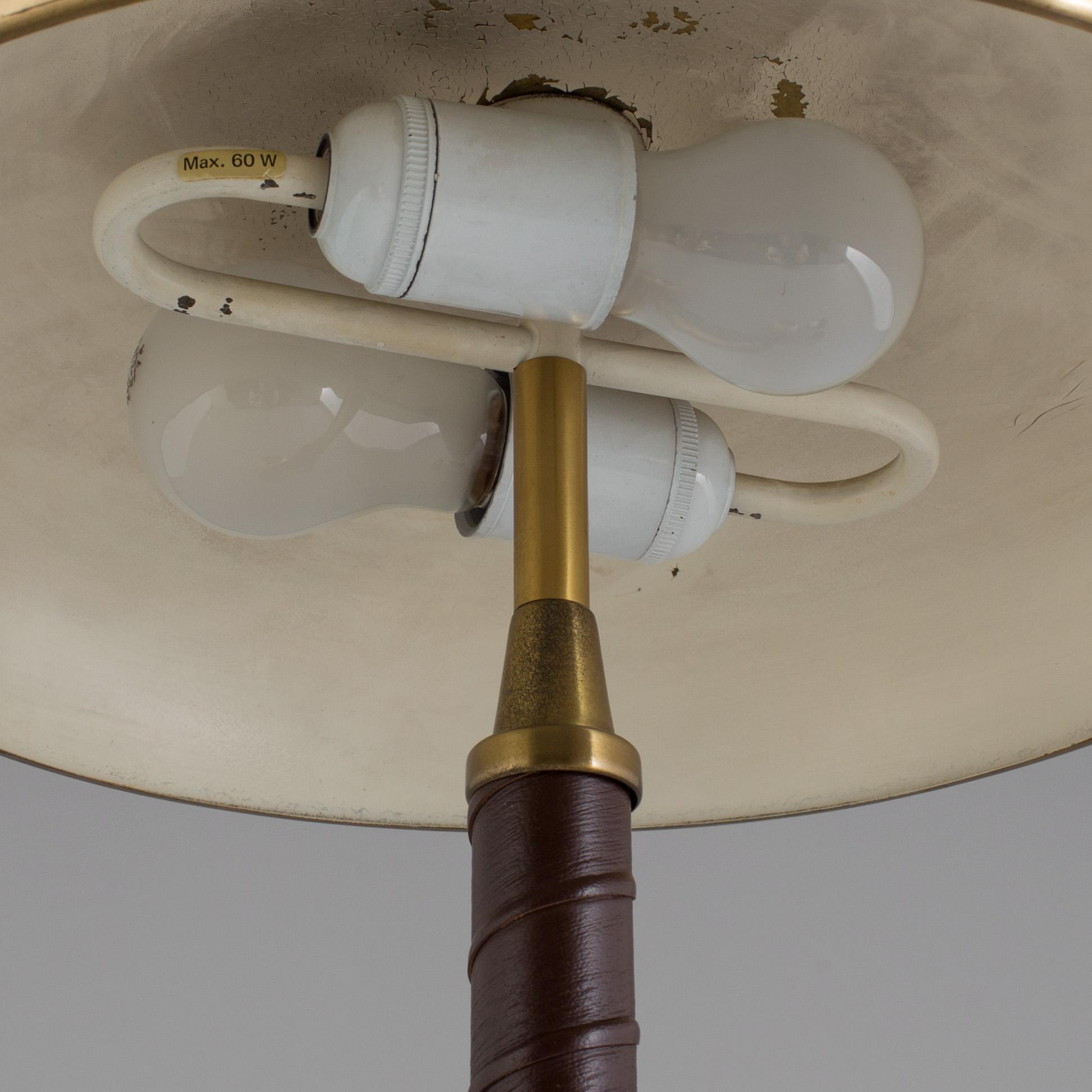A Swedish 20th century brushed brass table lamp by Einar Bäckström, Malmö.