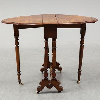 A 19th Century drop leaf table.