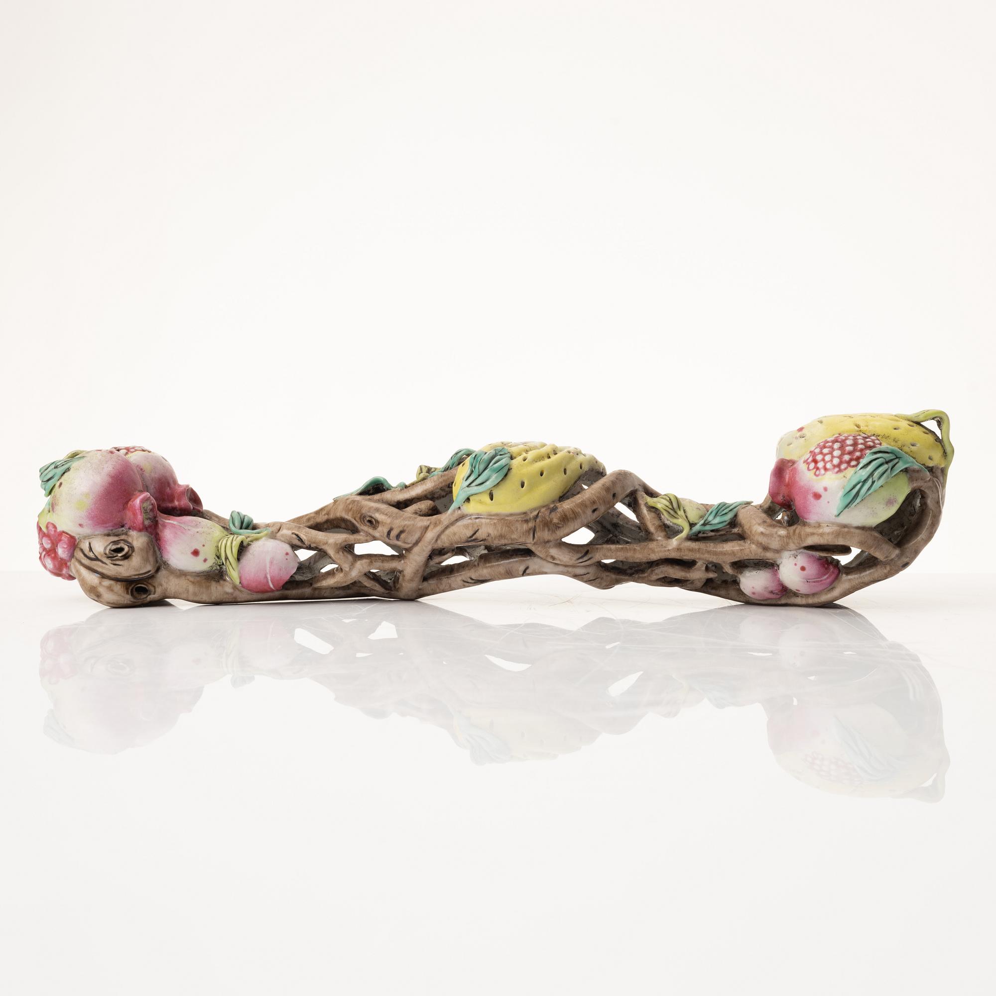 A Chinese porcelain ruyi-sceptre, late 20th century.