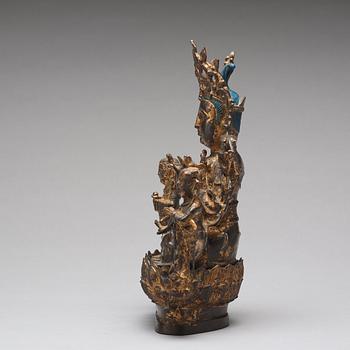 A bronze sculpture of boddhisattva and two attendants, Ming dynasty (1368-1644).