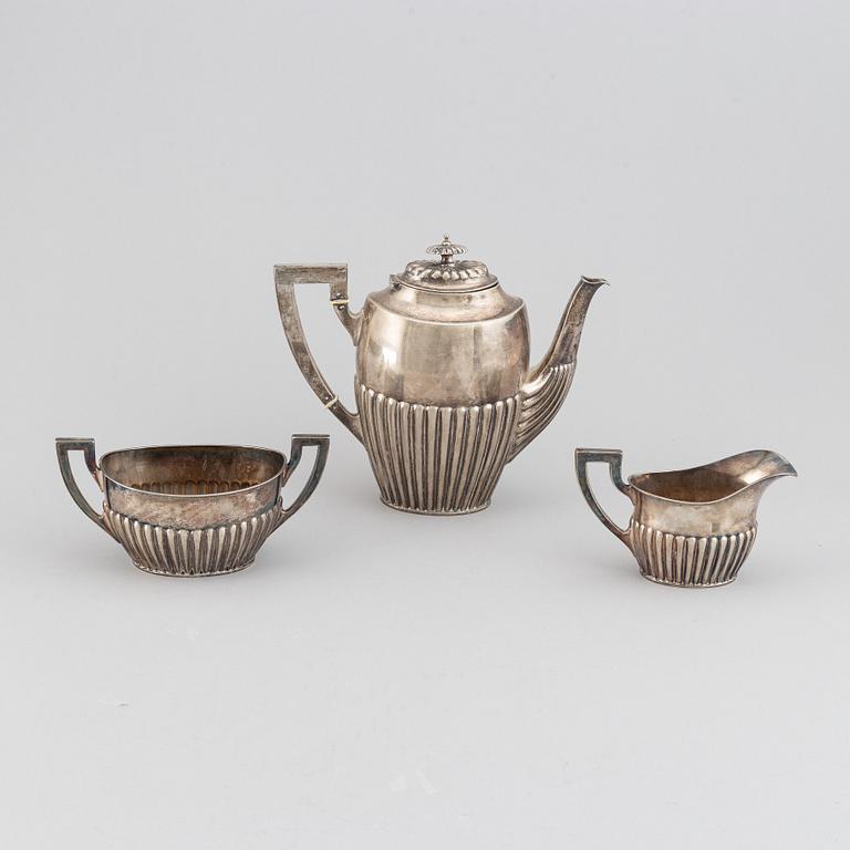 A silver coffee pot, creamer and sugar bowl, AG Dufva, Stockholm 1914.