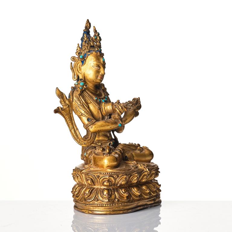 A gilt-bronze figure of Vajradhara
Tibet, circa 16th century.