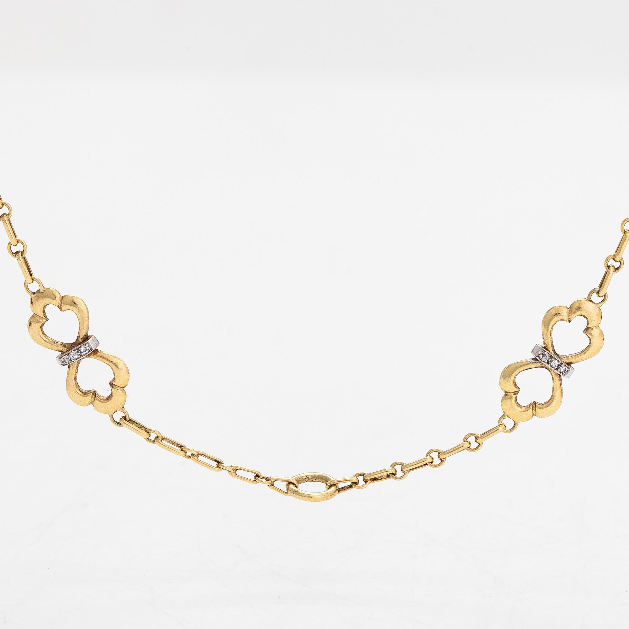 An 18K gold necklace, with diamonds totalling approx. 0.12 ct. Foreign hallmarks.