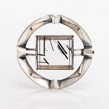 Elis Kauppi, A silver and rutile quartz brooch. Kupittaan kulta, Turku 1966.