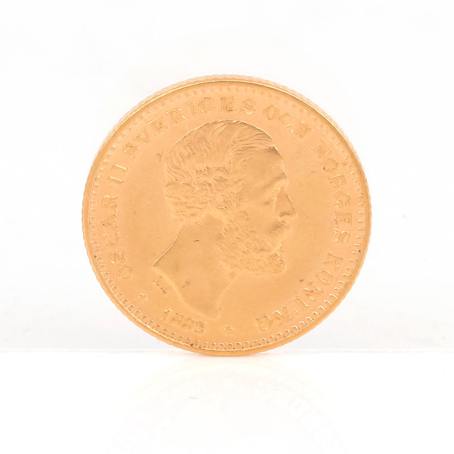 GULDMYNT, 10 kronor, Oscar II av Sverige och Norge 1883. Vikt ca 4,5 gram.