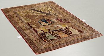 A CARPET, a semi-antique silk Tabriz figural, signed Haddad, 180,5 x 123,5 cm.