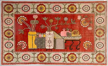 A CARPET, an antique/semi-antique Khotan figural, ca 259,5 x 160,5 cm.