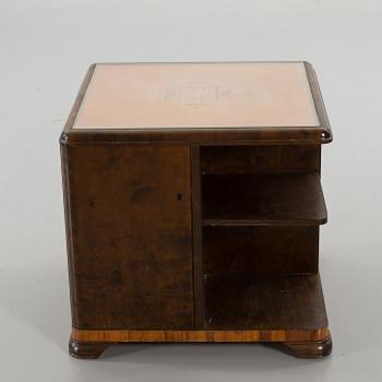 A 1940's smoking table.