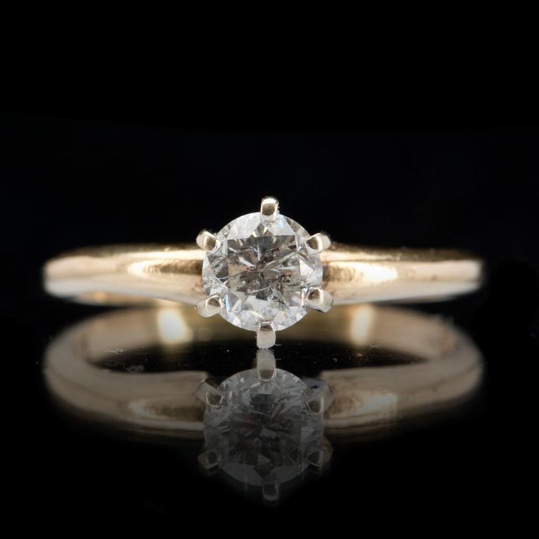 RING, 14 k guld med briljantslipad diamant ca 0,35 ct. Vikt ca 1,5 g.