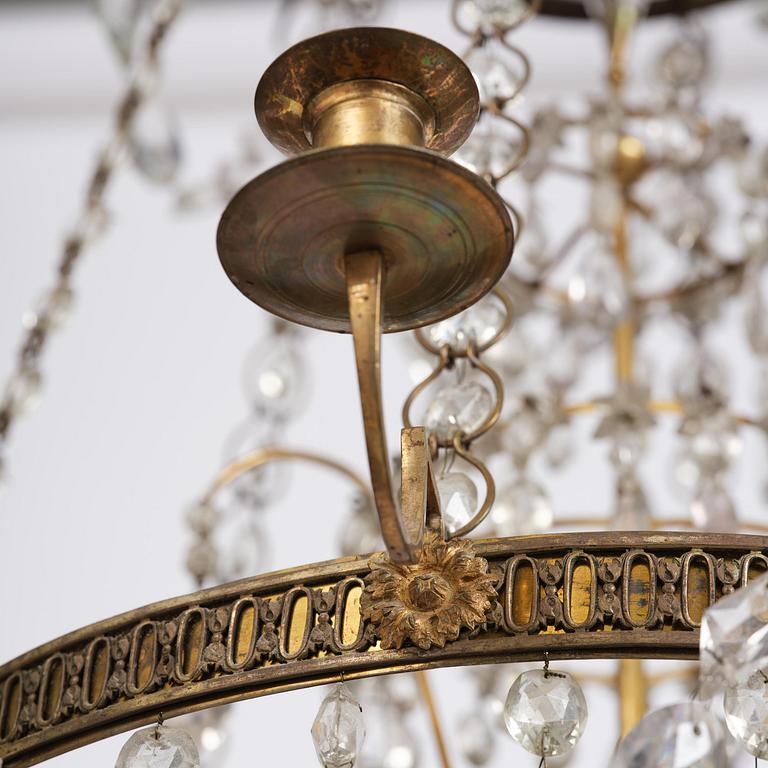 A Late gustavian green top glass six light chandelier.